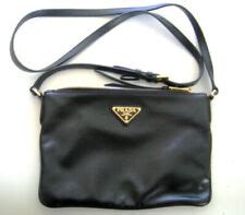 cuanto cuesta una cartera prada original|Carteras y monederos Prada para mujer — FARFETCH.